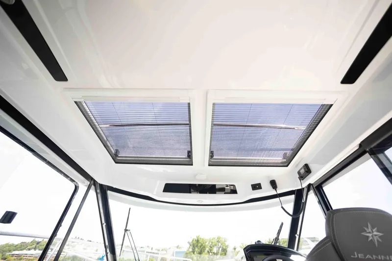 Slide: The Image of 2022 Jeanneau NC Weekender 895 interior roof with skylights and modern design. - 13