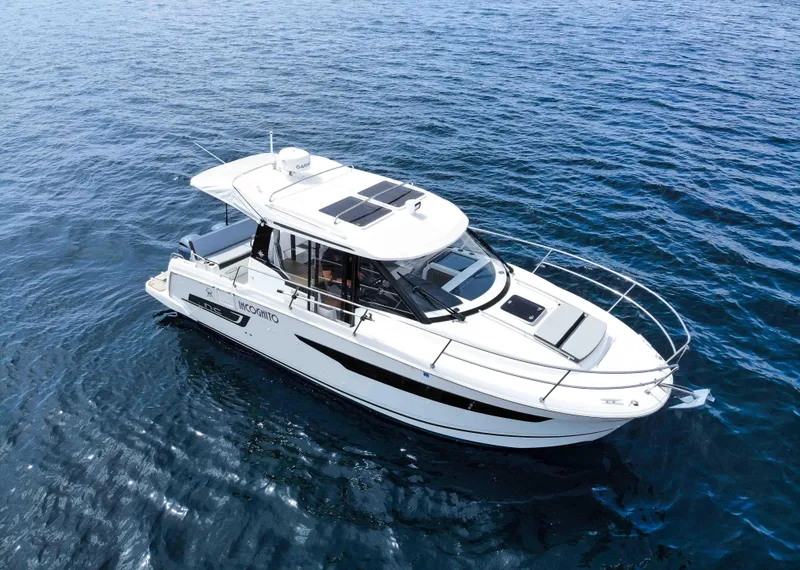 Slide: The Image of 2022 Jeanneau NC Weekender 895 cruising on open water, showcasing sleek design and modern features. - 3