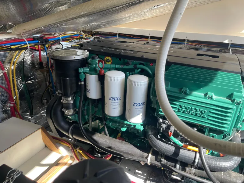 Slide: The Image of Engine compartment of a 2015 Fortier 30 boat with Volvo Penta components. - 33