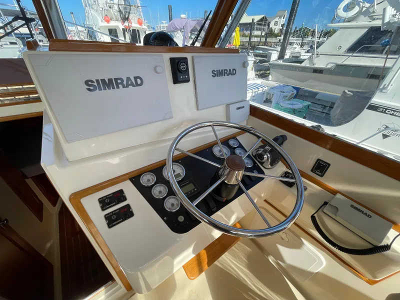 Slide: The Image of Helm of 2015 Fortier 30 boat with Simrad navigation system. - 8