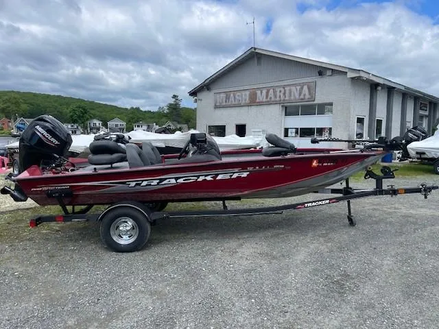 The Image of 2023 Tracker Pro Team 175 TXW boat on trailer at marina. - 0