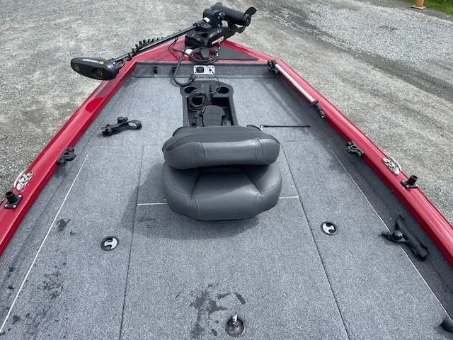 Slide: The Image of 2023 Tracker Pro Team 175 TXW boat with gray seating and red trim. - 10