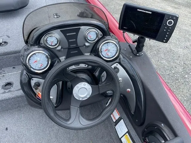 Slide: The Image of 2023 Tracker Pro Team 175 TXW dashboard with steering wheel and electronic display. - 11