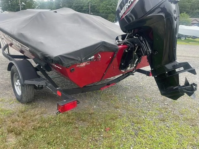 Slide: The Image of 2023 Tracker Pro Team 175 TXW boat with cover and Mercury outboard motor. - 3