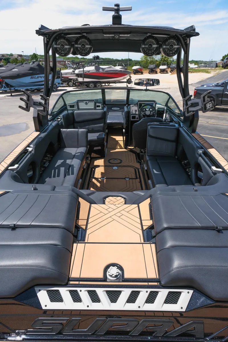 Slide: The Image of 2019 Supra SE450 boat interior with luxurious seating and advanced audio system. - 15
