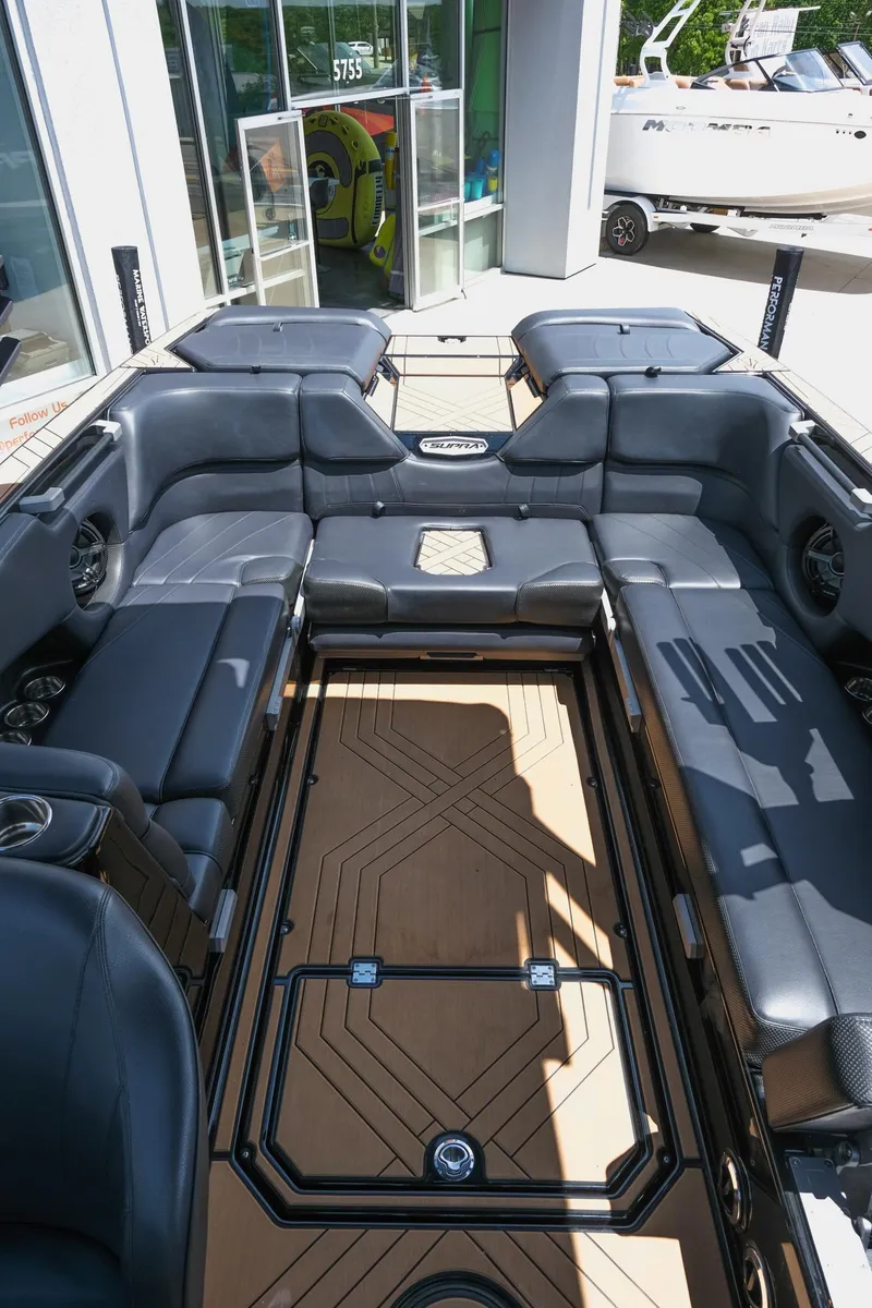 Slide: The Image of 2019 Supra SE450 boat interior with sleek seating and modern design. - 18