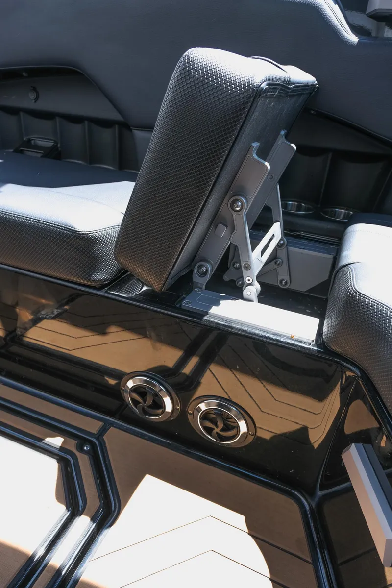 Slide: The Image of 2019 Supra SE450 boat interior with adjustable seating and sleek design. - 19