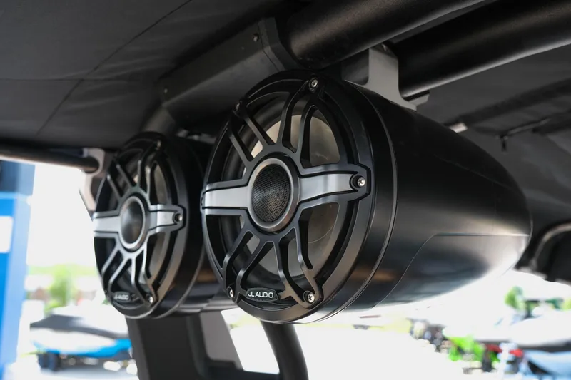 Slide: The Image of Speakers on a 2019 Supra SE450 boat, featuring sleek black design and durable construction. - 35