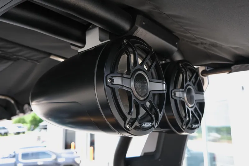 Slide: The Image of 2019 Supra SE450 boat speakers, black, mounted under canopy. - 36