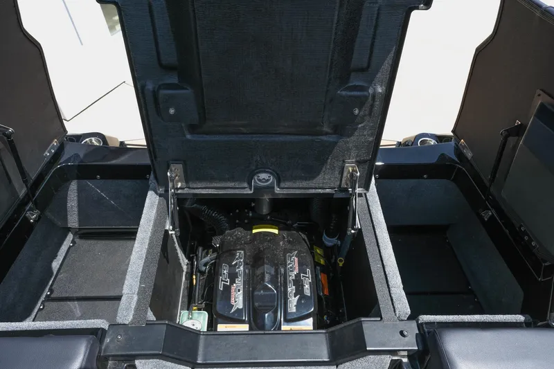 Slide: The Image of 2019 Supra SE450 engine compartment with open hatch, showcasing the engine layout and storage areas. - 39