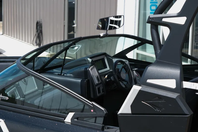 Slide: The Image of 2019 Supra SE450 boat interior with modern dashboard and steering wheel. - 4