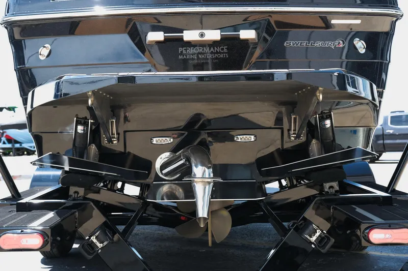 Slide: The Image of 2019 Supra SE450 boat rear view showcasing propeller and performance features. - 9