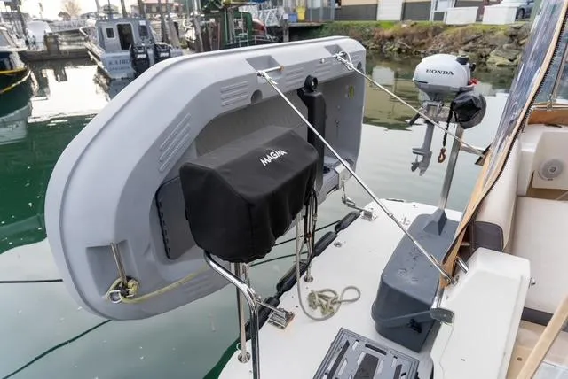Slide: The Image of 2015 Ranger Tugs R-31 CB boat with Honda motor and accessories at dock. - 11