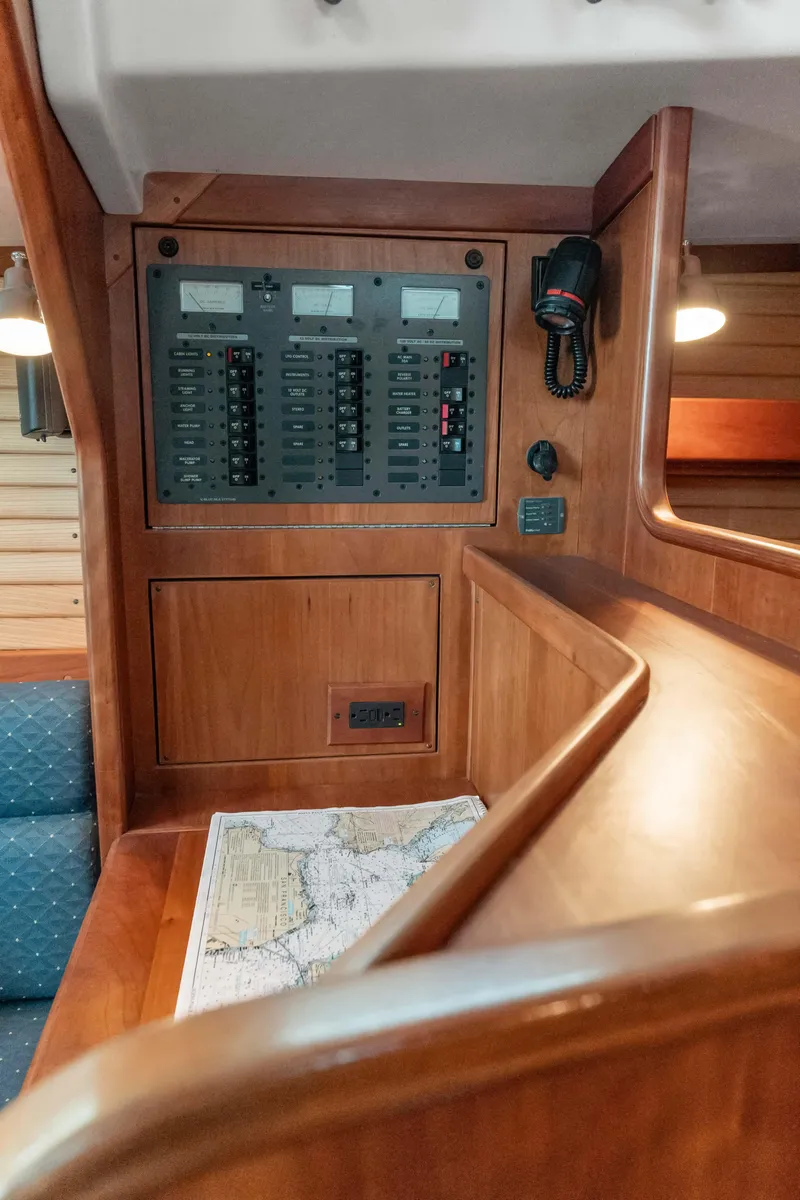 Slide: The Image of 2008 Sabre Spirit yacht interior with control panel and navigation map. - 21
