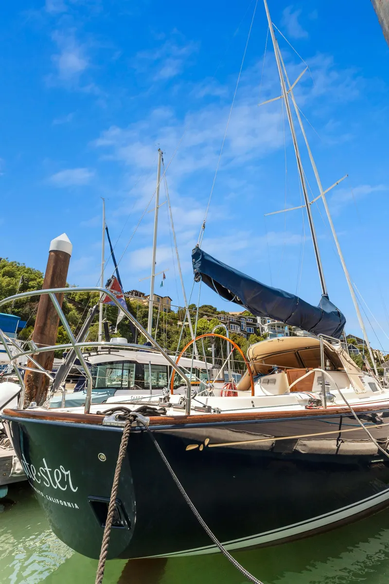 Slide: The Image of 2008 Sabre Spirit sailboat docked under clear blue sky. - 35