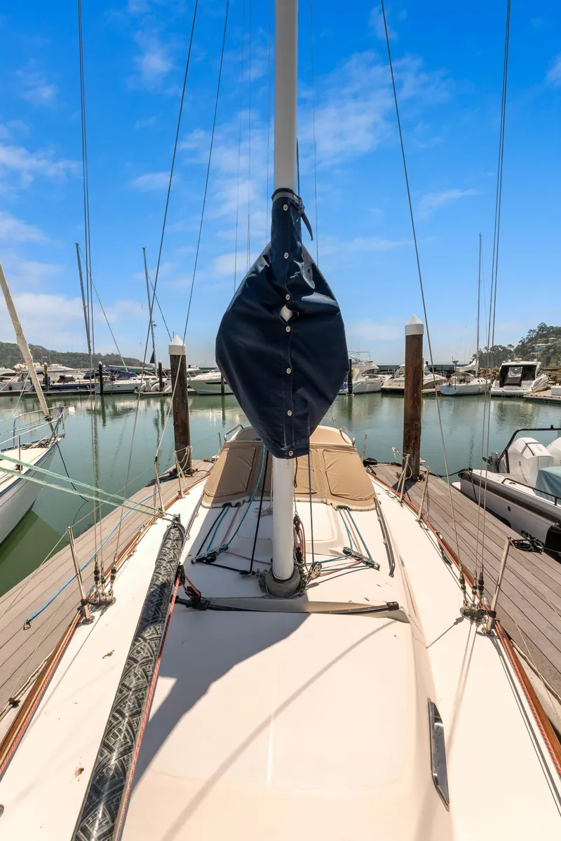 Slide: The Image of 2008 Sabre Spirit sailboat docked at marina under clear blue sky. - 44