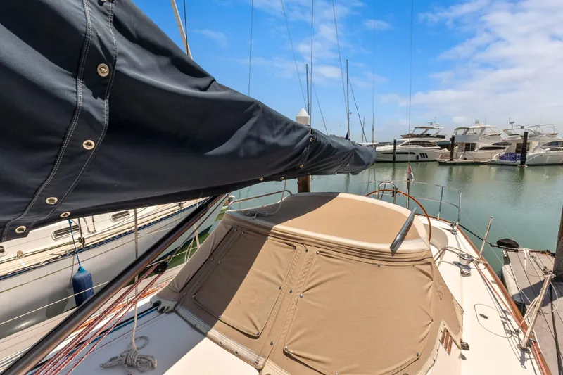 Slide: The Image of 2008 Sabre Spirit sailboat docked at marina with clear blue sky. - 45