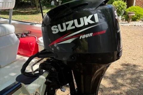 Slide: The Image of 2013 Key Largo 160 Center Console with Suzuki Four Stroke outboard motor. - 11