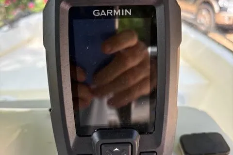 Slide: The Image of Garmin device on 2013 Key Largo 160 Center Console boat dashboard. - 8