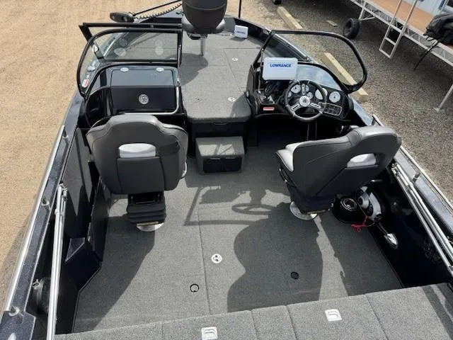 Slide: The Image of 2018 Nitro ZV18 boat interior with dual seats and control panel. - 6
