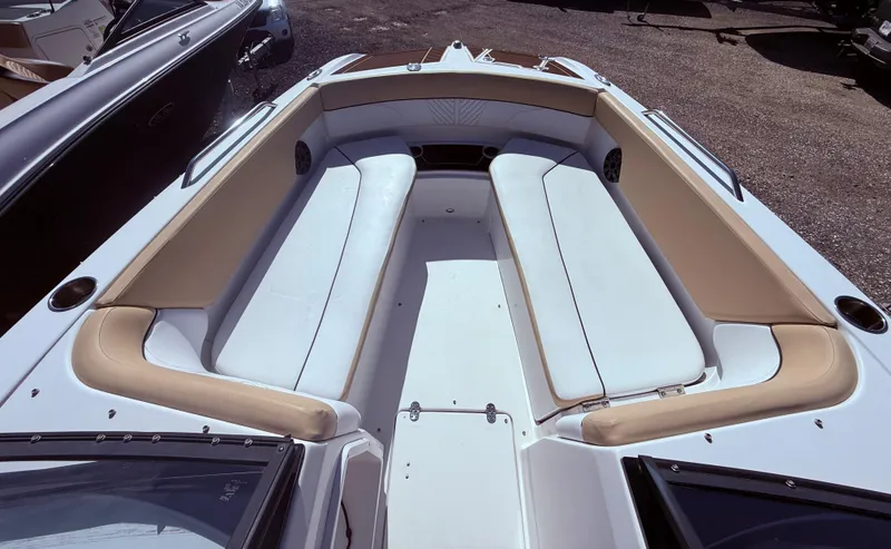 Slide: The Image of 2022 Glastron/Carlson GTD 220 boat interior with spacious seating and sleek design. - 10