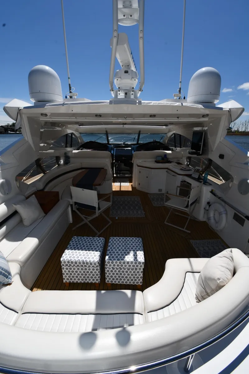 Slide: The Image of Luxurious 2002 Sunseeker 68 Predator yacht interior with elegant seating and modern amenities. - 19