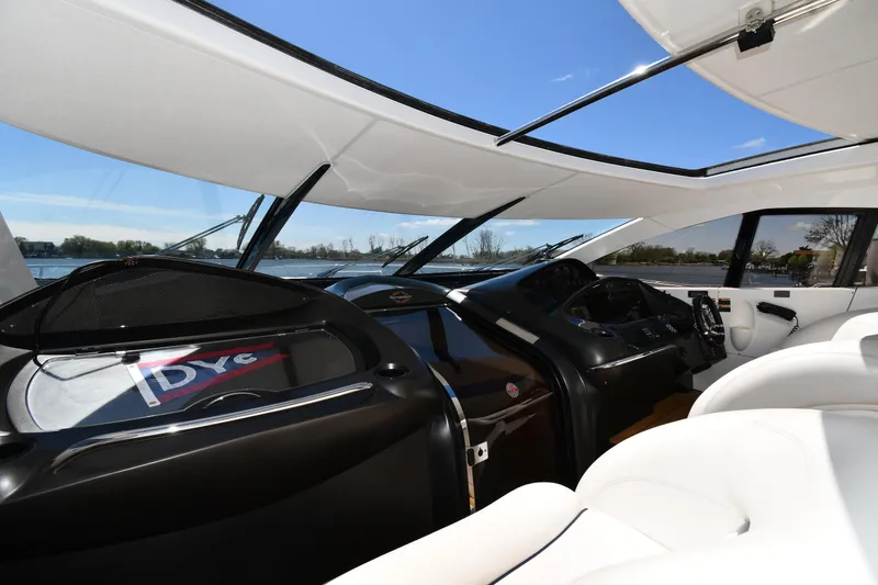 Slide: The Image of Luxurious interior of 2002 Sunseeker 68 Predator yacht with sleek design and panoramic windows. - 20