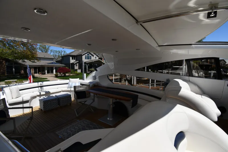 Slide: The Image of Luxurious 2002 Sunseeker 68 Predator yacht interior with elegant seating and modern design. - 34