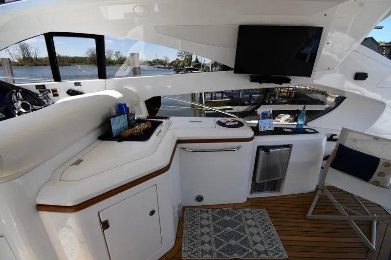Slide: The Image of Luxurious interior of 2002 Sunseeker 68 Predator yacht with modern amenities and scenic view. - 36