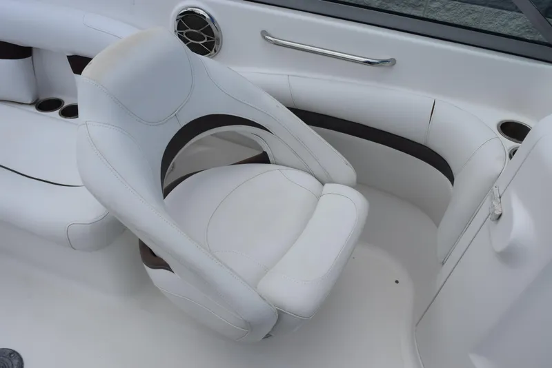 Slide: The Image of White seating area on a 2012 Hurricane SD2200 O/B boat interior. - 13