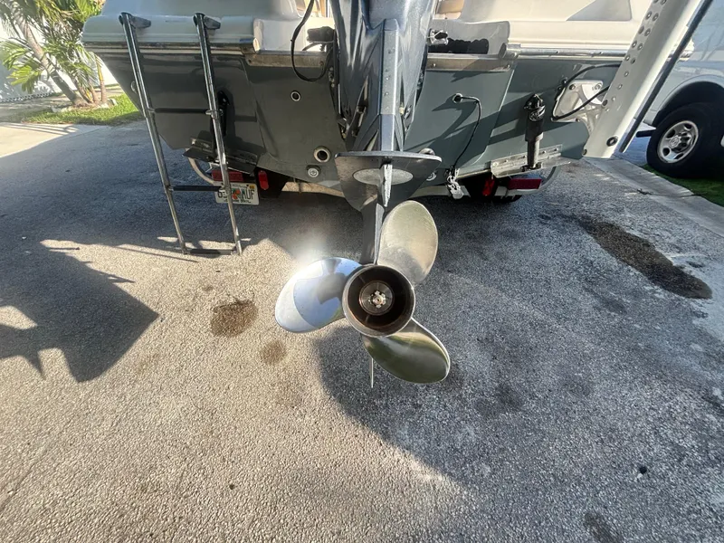 Slide: The Image of 2018 Key West 203 FS boat propeller and stern view on pavement. - 11
