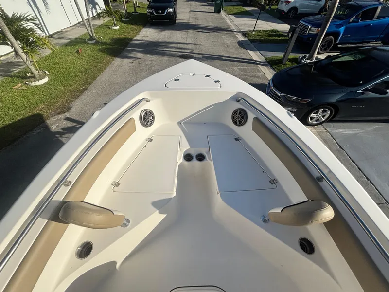 Slide: The Image of 2018 Key West 203 FS boat interior with seating and storage compartments. - 27