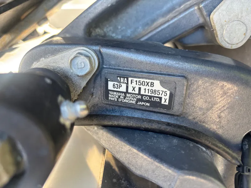 Slide: The Image of Close-up of Yamaha F150XB engine label on 2018 Key West 203 FS boat. - 33