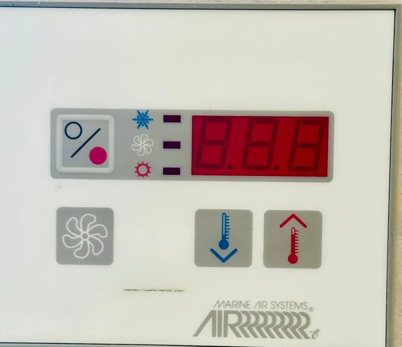 Slide: The Image of Marine air systems control panel on a 1997 Regal 320 Commodore boat. - 28