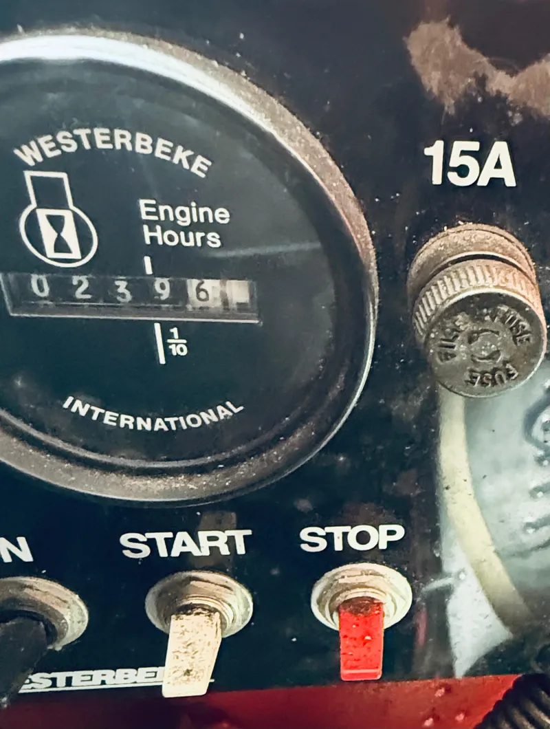 Slide: The Image of Close-up of a 1997 Regal 320 Commodore engine hour meter showing 2396 hours. - 36