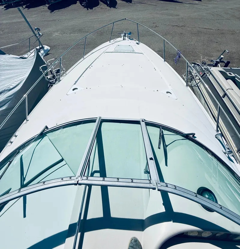 Slide: The Image of 1997 Regal 320 Commodore boat, aerial view of deck and windshield. - 4