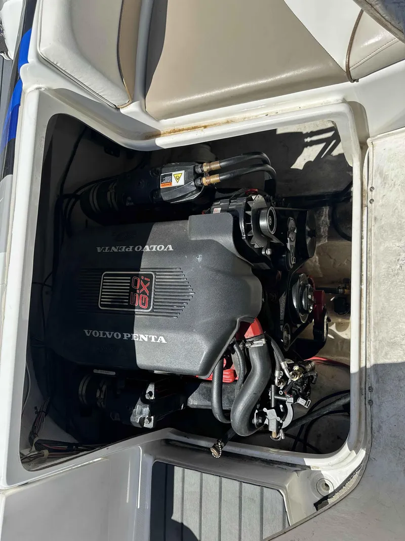 Slide: The Image of Engine compartment of a 2003 Glastron DX 235 boat with Volvo Penta engine. - 11