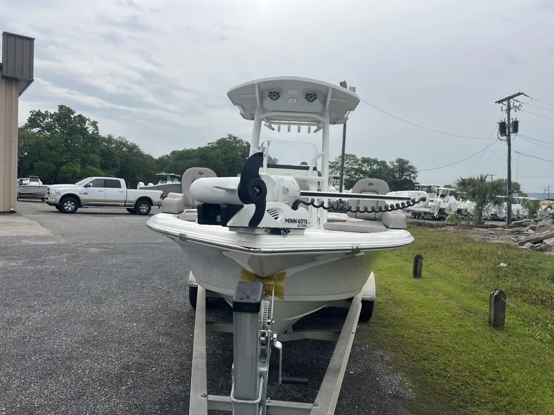 Slide: The Image of 2021 Sea Pro 228 Bay boat on trailer, equipped with Minn Kota trolling motor. - 7