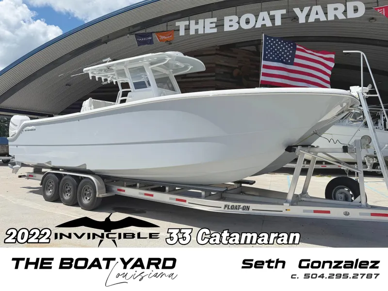 Slide: The Image of Invincible 33 Catamaran 2022 - 1
