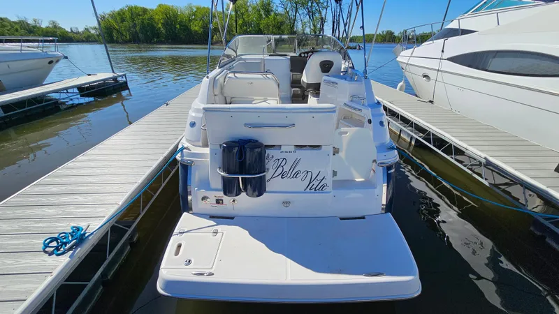 Slide: The Image of 2008 Regal 2565 Window Express boat docked at marina, rear view. - 4