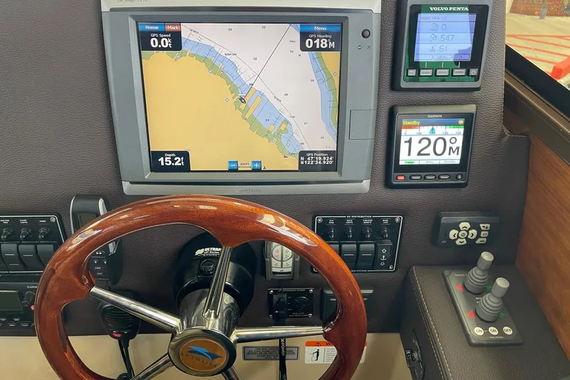 Slide: The Image of 2015 Cutwater C-28 helm with navigation and control systems. - 10