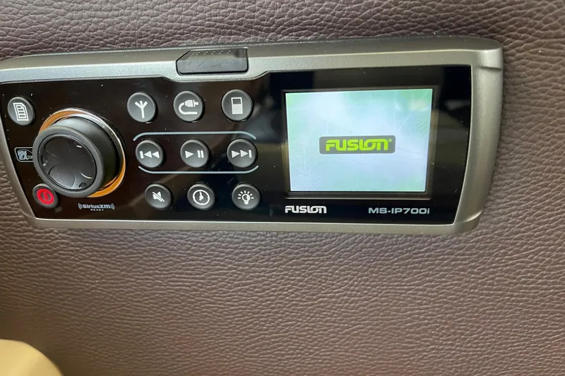 Slide: The Image of Fusion MS-IP700i stereo system on 2015 Cutwater C-28 boat dashboard. - 18