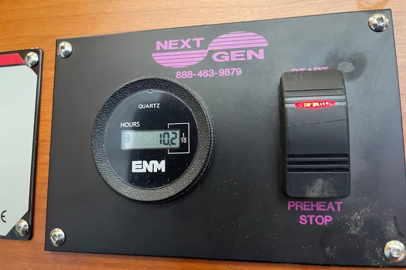 Slide: The Image of Next Gen control panel with hour meter and preheat stop switch on Cutwater C-28, 2015 model. - 21