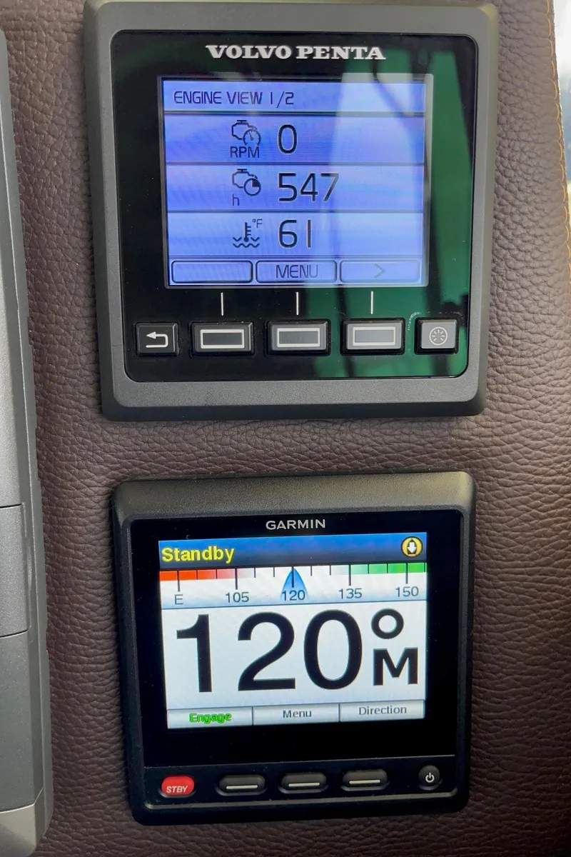 Slide: The Image of Volvo Penta and Garmin displays on 2015 Cutwater C-28 boat dashboard. - 9