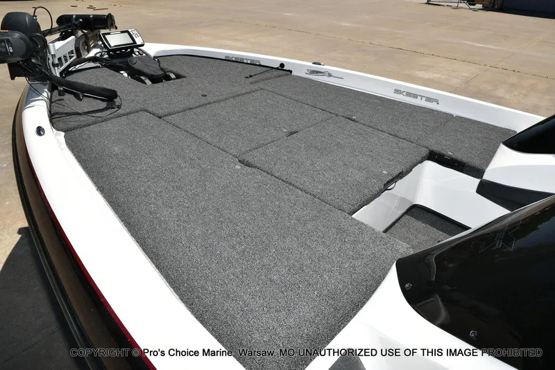 Slide: The Image of 2013 Skeeter ZX200 boat with spacious carpeted deck and advanced navigation equipment. - 12
