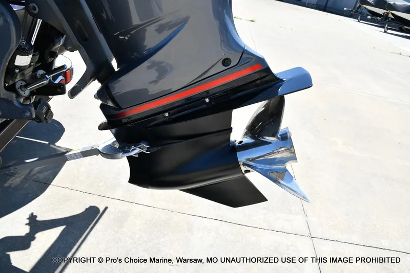Slide: The Image of 2013 Skeeter ZX200 boat motor and propeller on concrete surface. - 19