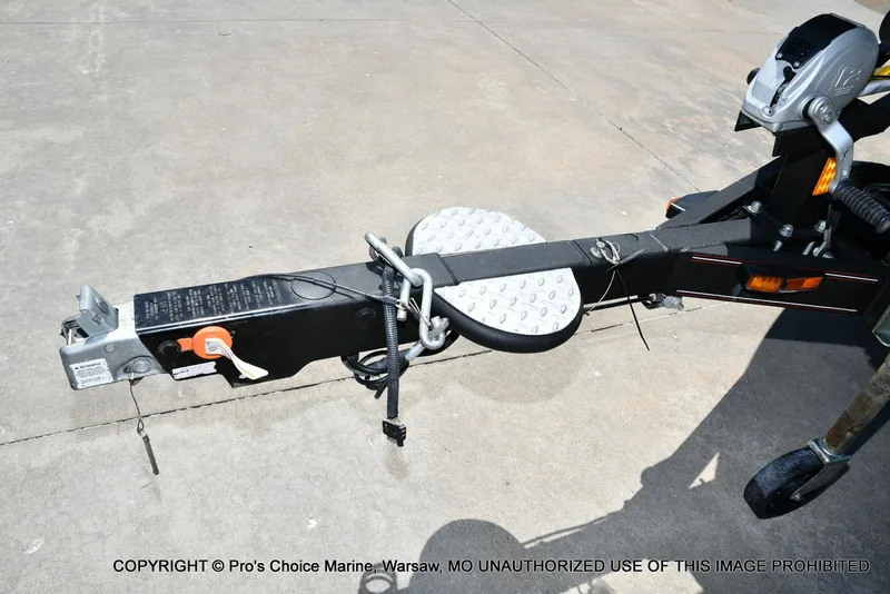Slide: The Image of Trailer hitch of a 2013 Skeeter ZX200 boat on concrete surface. - 29