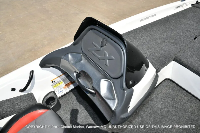 Slide: The Image of 2013 Skeeter ZX200 boat interior with carpeted deck and ZX logo. - 45