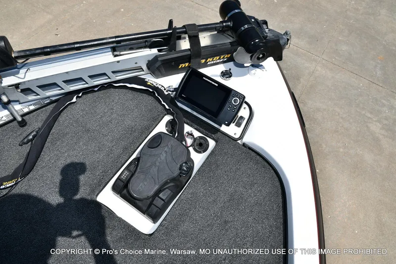Slide: The Image of 2013 Skeeter ZX200 boat deck with trolling motor and fish finder. - 48