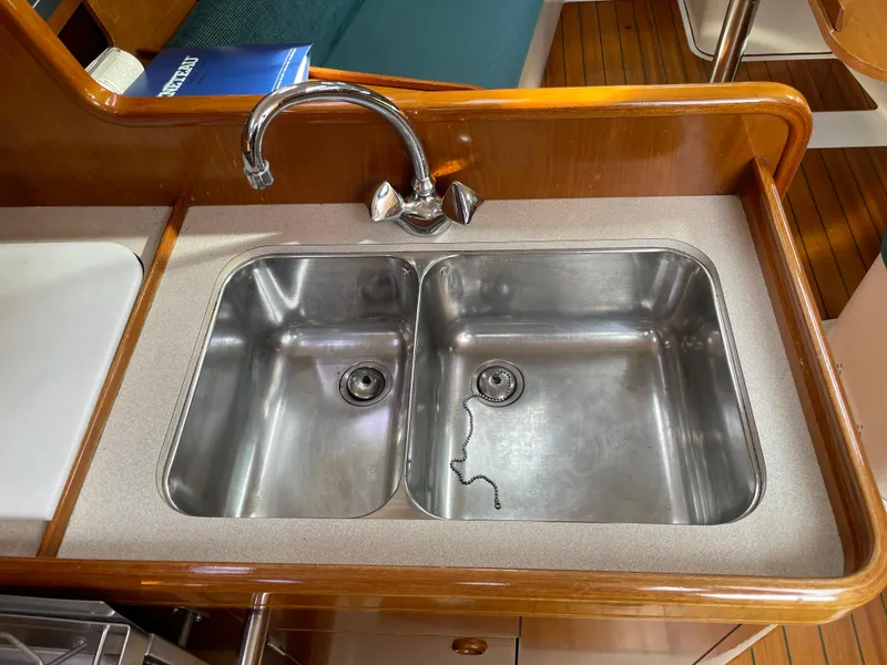 Slide: The Image of Double stainless steel sink in Beneteau Oceanis 321 yacht kitchen, 2000 model. - 14